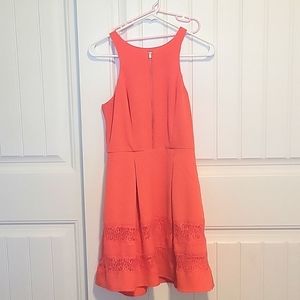 Lacy, red-orange sleeveless dress